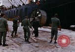 Image of loading of cargo onto a ship Saigon Vietnam, 1966, second 20 stock footage video 65675037333