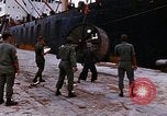 Image of loading of cargo onto a ship Saigon Vietnam, 1966, second 21 stock footage video 65675037333