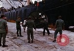 Image of loading of cargo onto a ship Saigon Vietnam, 1966, second 22 stock footage video 65675037333