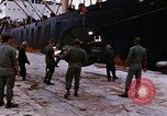 Image of loading of cargo onto a ship Saigon Vietnam, 1966, second 23 stock footage video 65675037333