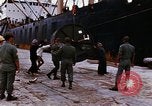 Image of loading of cargo onto a ship Saigon Vietnam, 1966, second 24 stock footage video 65675037333