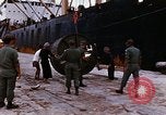 Image of loading of cargo onto a ship Saigon Vietnam, 1966, second 25 stock footage video 65675037333
