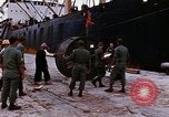 Image of loading of cargo onto a ship Saigon Vietnam, 1966, second 26 stock footage video 65675037333