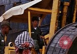 Image of loading of cargo onto a ship Saigon Vietnam, 1966, second 28 stock footage video 65675037333