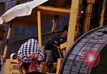 Image of loading of cargo onto a ship Saigon Vietnam, 1966, second 29 stock footage video 65675037333