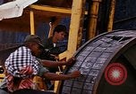 Image of loading of cargo onto a ship Saigon Vietnam, 1966, second 31 stock footage video 65675037333