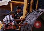 Image of loading of cargo onto a ship Saigon Vietnam, 1966, second 32 stock footage video 65675037333