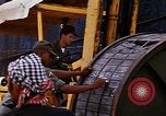 Image of loading of cargo onto a ship Saigon Vietnam, 1966, second 33 stock footage video 65675037333