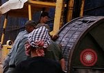 Image of loading of cargo onto a ship Saigon Vietnam, 1966, second 35 stock footage video 65675037333