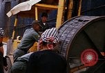 Image of loading of cargo onto a ship Saigon Vietnam, 1966, second 37 stock footage video 65675037333