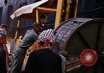 Image of loading of cargo onto a ship Saigon Vietnam, 1966, second 38 stock footage video 65675037333