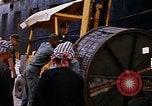 Image of loading of cargo onto a ship Saigon Vietnam, 1966, second 39 stock footage video 65675037333