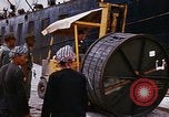 Image of loading of cargo onto a ship Saigon Vietnam, 1966, second 42 stock footage video 65675037333