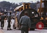 Image of loading of cargo onto a ship Saigon Vietnam, 1966, second 46 stock footage video 65675037333