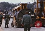 Image of loading of cargo onto a ship Saigon Vietnam, 1966, second 47 stock footage video 65675037333