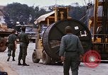 Image of loading of cargo onto a ship Saigon Vietnam, 1966, second 48 stock footage video 65675037333