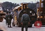Image of loading of cargo onto a ship Saigon Vietnam, 1966, second 49 stock footage video 65675037333