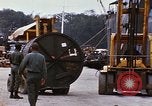 Image of loading of cargo onto a ship Saigon Vietnam, 1966, second 51 stock footage video 65675037333