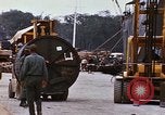 Image of loading of cargo onto a ship Saigon Vietnam, 1966, second 52 stock footage video 65675037333