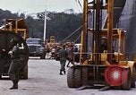 Image of loading of cargo onto a ship Saigon Vietnam, 1966, second 55 stock footage video 65675037333