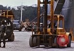 Image of loading of cargo onto a ship Saigon Vietnam, 1966, second 56 stock footage video 65675037333