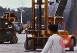 Image of loading of cargo onto a ship Saigon Vietnam, 1966, second 57 stock footage video 65675037333