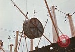 Image of loading of cargo onto a ship Saigon Vietnam, 1966, second 61 stock footage video 65675037333