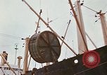 Image of loading of cargo onto a ship Saigon Vietnam, 1966, second 62 stock footage video 65675037333