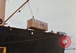 Image of unloading carrier vehicle Saigon Vietnam, 1966, second 5 stock footage video 65675037334