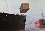 Image of unloading carrier vehicle Saigon Vietnam, 1966, second 11 stock footage video 65675037334