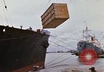 Image of unloading carrier vehicle Saigon Vietnam, 1966, second 13 stock footage video 65675037334