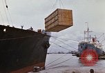Image of unloading carrier vehicle Saigon Vietnam, 1966, second 15 stock footage video 65675037334