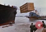 Image of unloading carrier vehicle Saigon Vietnam, 1966, second 18 stock footage video 65675037334