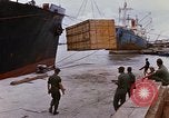 Image of unloading carrier vehicle Saigon Vietnam, 1966, second 21 stock footage video 65675037334