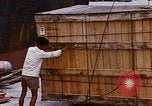 Image of unloading carrier vehicle Saigon Vietnam, 1966, second 24 stock footage video 65675037334