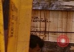 Image of unloading carrier vehicle Saigon Vietnam, 1966, second 31 stock footage video 65675037334