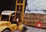 Image of unloading carrier vehicle Saigon Vietnam, 1966, second 33 stock footage video 65675037334
