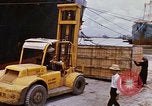 Image of unloading carrier vehicle Saigon Vietnam, 1966, second 34 stock footage video 65675037334