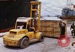 Image of unloading carrier vehicle Saigon Vietnam, 1966, second 37 stock footage video 65675037334