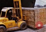 Image of unloading carrier vehicle Saigon Vietnam, 1966, second 40 stock footage video 65675037334