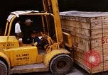 Image of unloading carrier vehicle Saigon Vietnam, 1966, second 43 stock footage video 65675037334