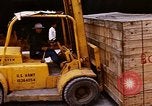 Image of unloading carrier vehicle Saigon Vietnam, 1966, second 44 stock footage video 65675037334