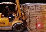 Image of unloading carrier vehicle Saigon Vietnam, 1966, second 45 stock footage video 65675037334