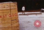 Image of unloading carrier vehicle Saigon Vietnam, 1966, second 48 stock footage video 65675037334