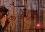 Image of unloading carrier vehicle Saigon Vietnam, 1966, second 52 stock footage video 65675037334