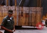 Image of unloading carrier vehicle Saigon Vietnam, 1966, second 53 stock footage video 65675037334