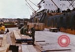 Image of unloading carrier vehicle Saigon Vietnam, 1966, second 59 stock footage video 65675037334