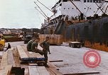 Image of unloading carrier vehicle Saigon Vietnam, 1966, second 61 stock footage video 65675037334