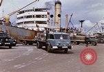 Image of Unloading of oil barrels Saigon Vietnam, 1966, second 16 stock footage video 65675037335