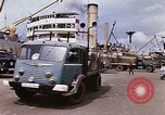 Image of Unloading of oil barrels Saigon Vietnam, 1966, second 19 stock footage video 65675037335